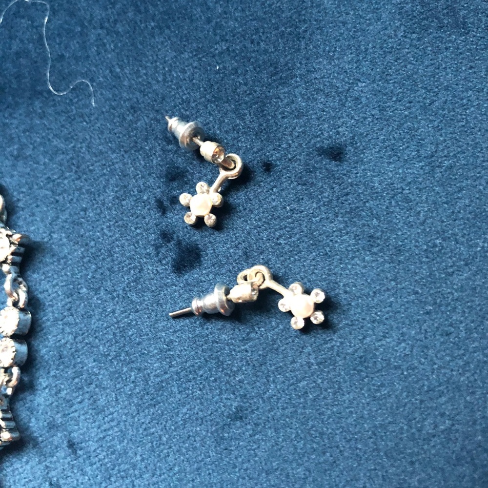3 pairs of earrings and bracelet